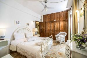 Postel nebo postele na pokoji v ubytování Villa Stella + 22 fotografií