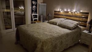 Postel nebo postele na pokoji v ubytování Appartement lumineux vue mer