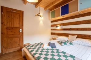 Letto o letti in una camera di SoHome Le Chable