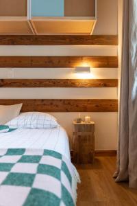 Letto o letti in una camera di SoHome Le Chable