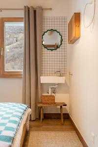 Letto o letti in una camera di SoHome Le Chable
