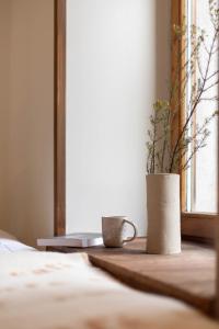 Letto o letti in una camera di SoHome Le Chable