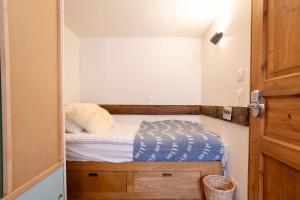 Letto o letti in una camera di SoHome Le Chable