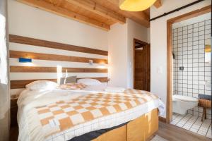 Letto o letti in una camera di SoHome Le Chable