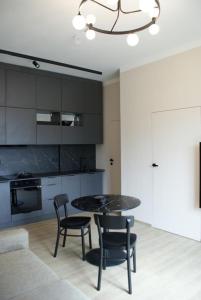 Köök või kööginurk majutusasutuses Giertmaņa apartamenti