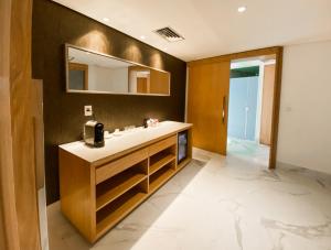 a bathroom with a sink and a mirror at Hotel Nacional Rio de Janeiro - OFICIAL in Rio de Janeiro