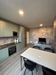 Kuchyň nebo kuchyňský kout v ubytování Corte Grande Apartment