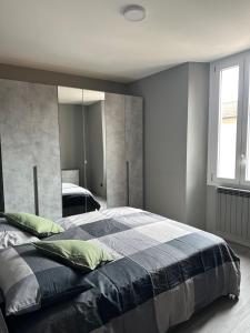Postel nebo postele na pokoji v ubytování Corte Grande Apartment