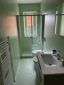Koupelna v ubytování Corte Grande Apartment