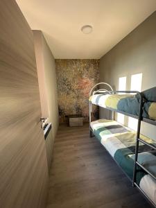 Postel nebo postele na pokoji v ubytování Corte Grande Apartment