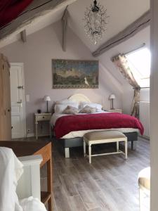 Кровать или кровати в номере Les Colonnes De Chanteloup