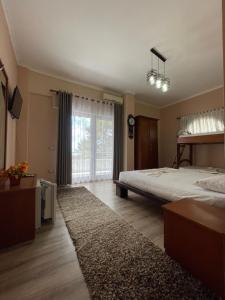 Voodi või voodid majutusasutuse Hotel Benilva toas