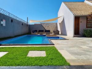 Piscina en o cerca de Loft Elegante no coração de Pirenópolis