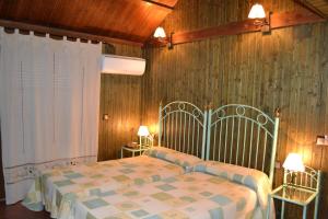 Gulta vai gultas numurā naktsmītnē Hotel Rural El Labriego by Vivere Stays