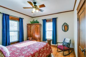 A bed or beds in a room at Charming Winterset Vacation Rental with Yard and Patio