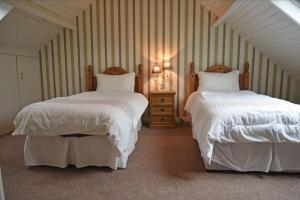 Postel nebo postele na pokoji v ubytování Mardan House B&B
