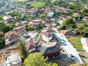 an aerial view of a residential suburb with houses at Kikonia Art & Suites in Akyaka