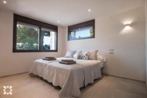 Posteľ alebo postele v izbe v ubytovaní Villa Los Roques by Abahana Villas