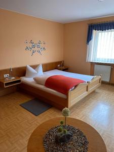 Krevet ili kreveti u jedinici u objektu Gästehaus Krone