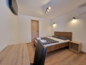 Postel nebo postele na pokoji v ubytování Room D