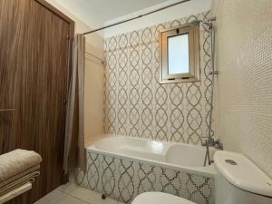 Koupelna v ubytování Halcyon Central Apartment + 32 fotografií