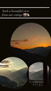 a view of a sunset through a window at The overlook cottage in Batumi