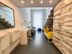 Televízia a/alebo spoločenská miestnosť v ubytovaní Modern stylish 2 bedroom holiday apartment