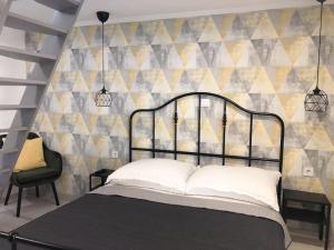 Postel nebo postele na pokoji v ubytování Casa Tibor