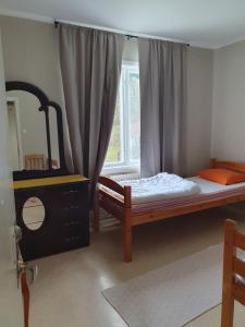 Ένα ή περισσότερα κρεβάτια σε δωμάτιο στο Lägenhet 50kvm, Kolmården Apartments & Cottage