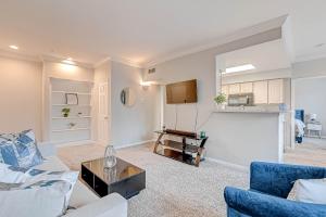 a living room with two couches and a piano at Med Center Urban living in Houston