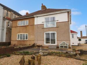 a house with a garden in front of it at 12 Pennystone Road in Blackpool