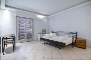Kastella cozy flat for 2 persons my MPS tesisinde bir odada yatak veya yataklar