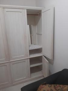 Ένα ή περισσότερα κρεβάτια σε δωμάτιο στο Cantinho +4 φωτογραφίες