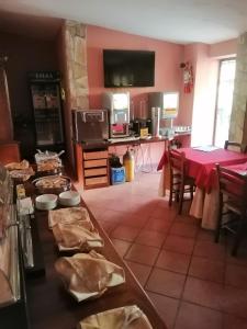 Kuchyň nebo kuchyňský kout v ubytování Hotel Villaggio Tabù