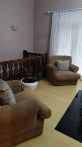 Posezení v ubytování Casa de 2 Pavimentos Inteira com garagem
