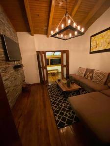 Posezení v ubytování Agradable cabaña en Tapalpa