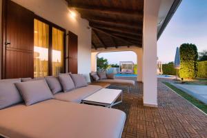 Posezení v ubytování Villa Melody, a luxurious Holiday Retreat