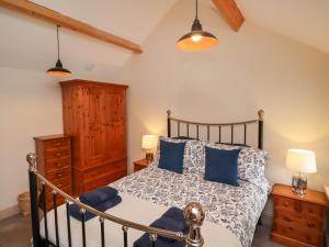 Ένα ή περισσότερα κρεβάτια σε δωμάτιο στο Cragg Lodge