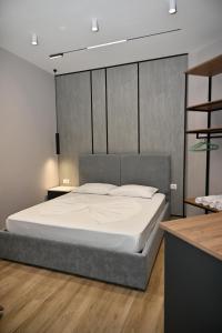 Postel nebo postele na pokoji v ubytování MondurO Hotel
