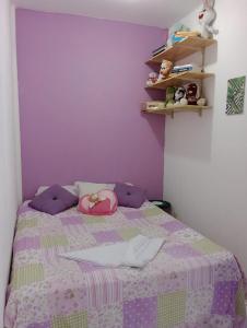 Postel nebo postele na pokoji v ubytování Cantinho do Pará 1