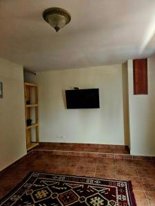 TV a/nebo společenská místnost v ubytování Bliss house cielo 92