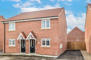 an image of a red brick house at Poppy House - Coastal Getaway 2 Bedroom in Scalby in Scalby