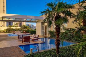 Bazén v ubytování Loft Moderno AH1105 Alto Padrão Localização Nobre nebo v jeho okolí