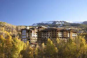 a large building on the side of a mountain at Snowmass Viceroy 1 Bedroom Residence in Snowmass Village