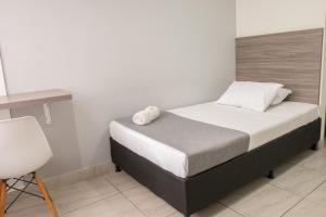 Voodi või voodid majutusasutuse HOTEl INTER DEL CAFE toas