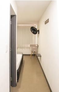 Voodi või voodid majutusasutuse HOTEl INTER DEL CAFE toas