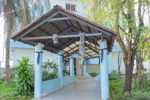 a pavilion in front of a building at Hotel Azur Conakry in Conakry