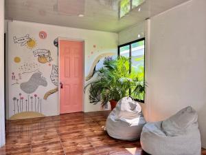 Фотография из галереи La Tribu Boutique Hostel for women в Пуэрто-Вьехо