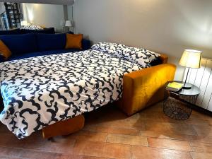 Ein Bett oder Betten in einem Zimmer der Unterkunft Attico in Piazza Matteotti