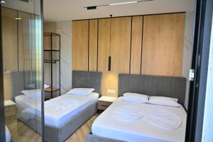 Postel nebo postele na pokoji v ubytování MondurO Hotel